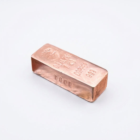 Lingot cuivre 1kg artisanal numéroté, vue de côté — Atelier Oralyse